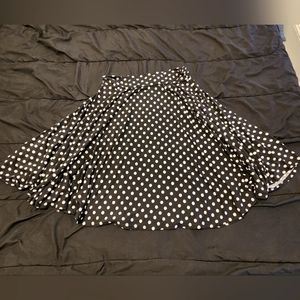 Black and white polka dot skirt.